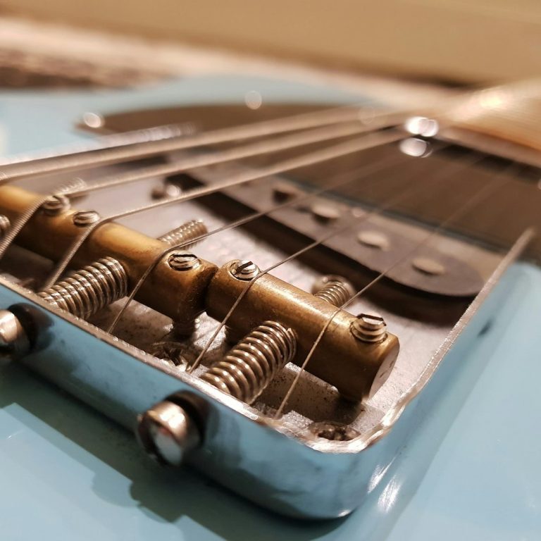 Guitar hardware installation and upgrades Electric guitar fitted with upgraded hardware including tuners and bridge components